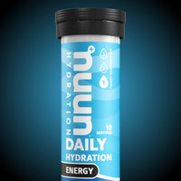 Tube of Nuun Energy against a blue and black background.