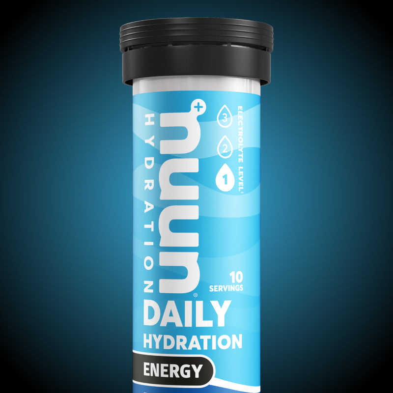 Tube of Nuun Energy against a blue and black background.